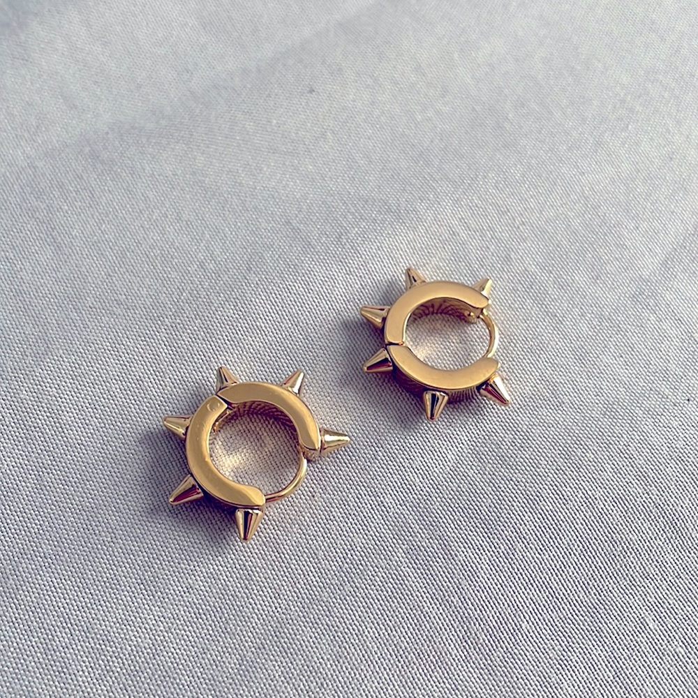 Gold stud earrings